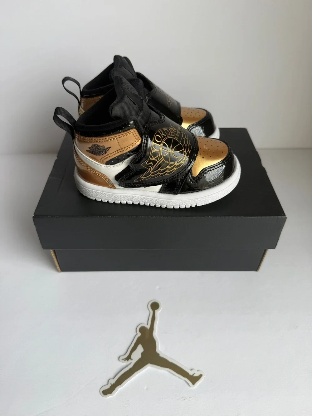 Jordan Baby High-Top Sneakers in Black and Gold